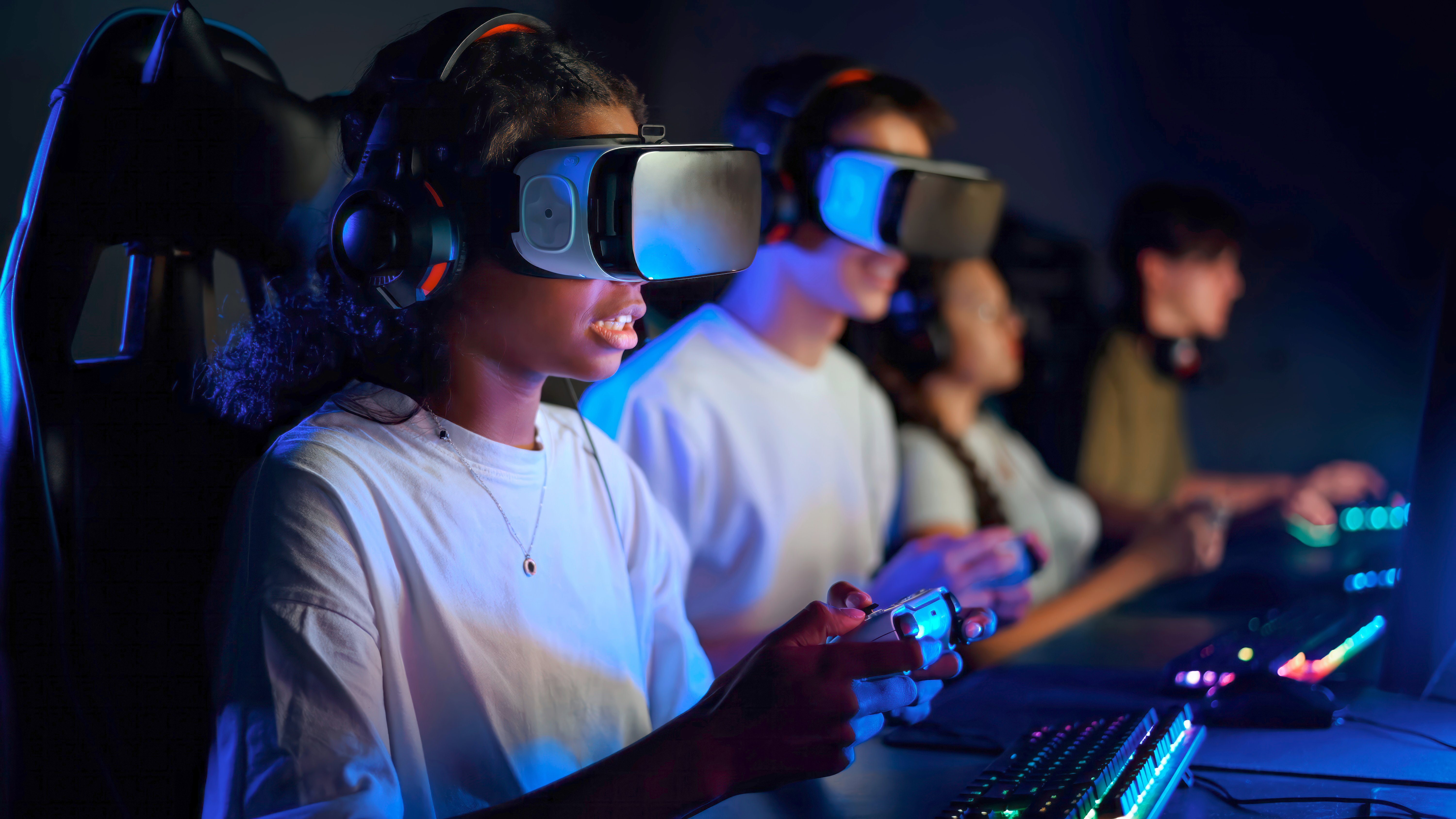 black-teen-smiling-girl-vr-headset-playing-video-games-using-gamepad-video-game-club